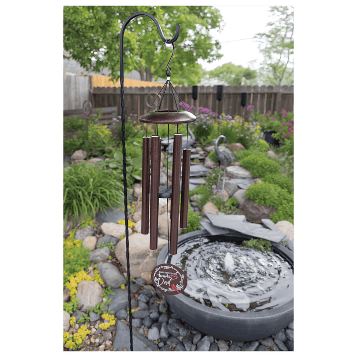 HipFlaskPlus personalized Highland Cow copper powder coated wind chime in a garden