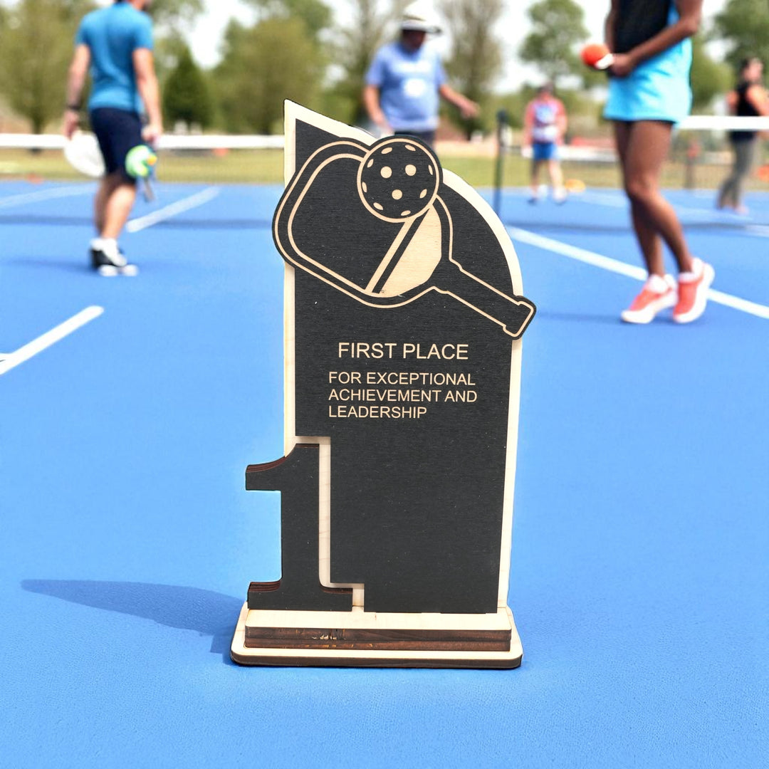 HipFlaskPlus custom Pickleball first place trophy award on a pickleball court