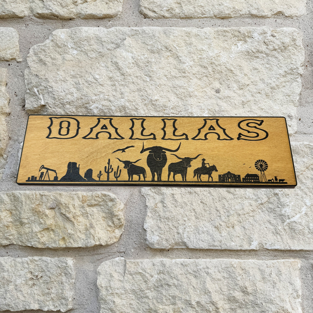 HipFlaskPlus Dallas landscape black and natural wood sign on a stone wall