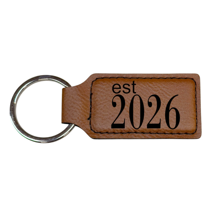 HipFlaskPlus brown leather rectangle keychain with Est 2026 engraving