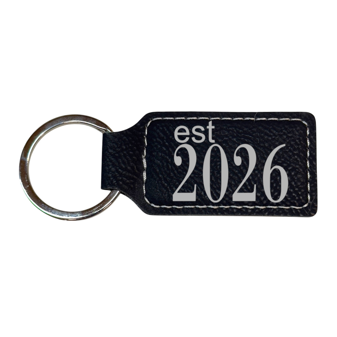 HipFlaskPlus black leather rectangle keychain with Est 2026 engraving