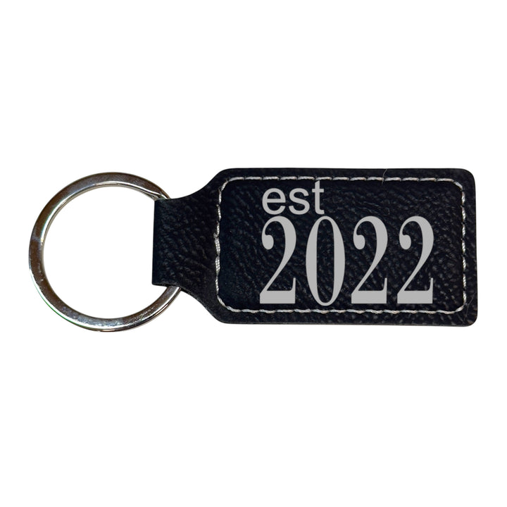 HipFlaskPlus black leather rectangle keychain with Est 2022 engraving
