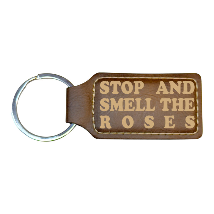 HipFlaskPlus rustic brown leather rectangle keychain with Stop and Smell the Roses engraving