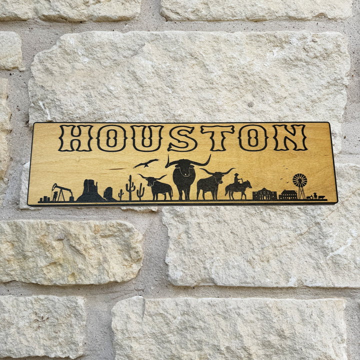 HipFlaskPlus Houston landscape black and natural wood sign on a stone wall