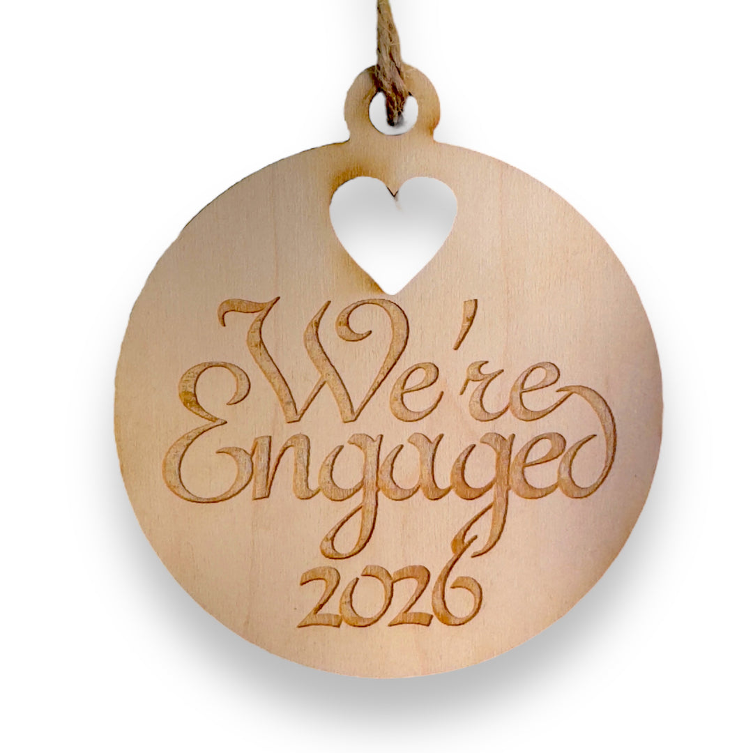 HipFlaskPlus raw wood We're Engaged 2026 heart ornament