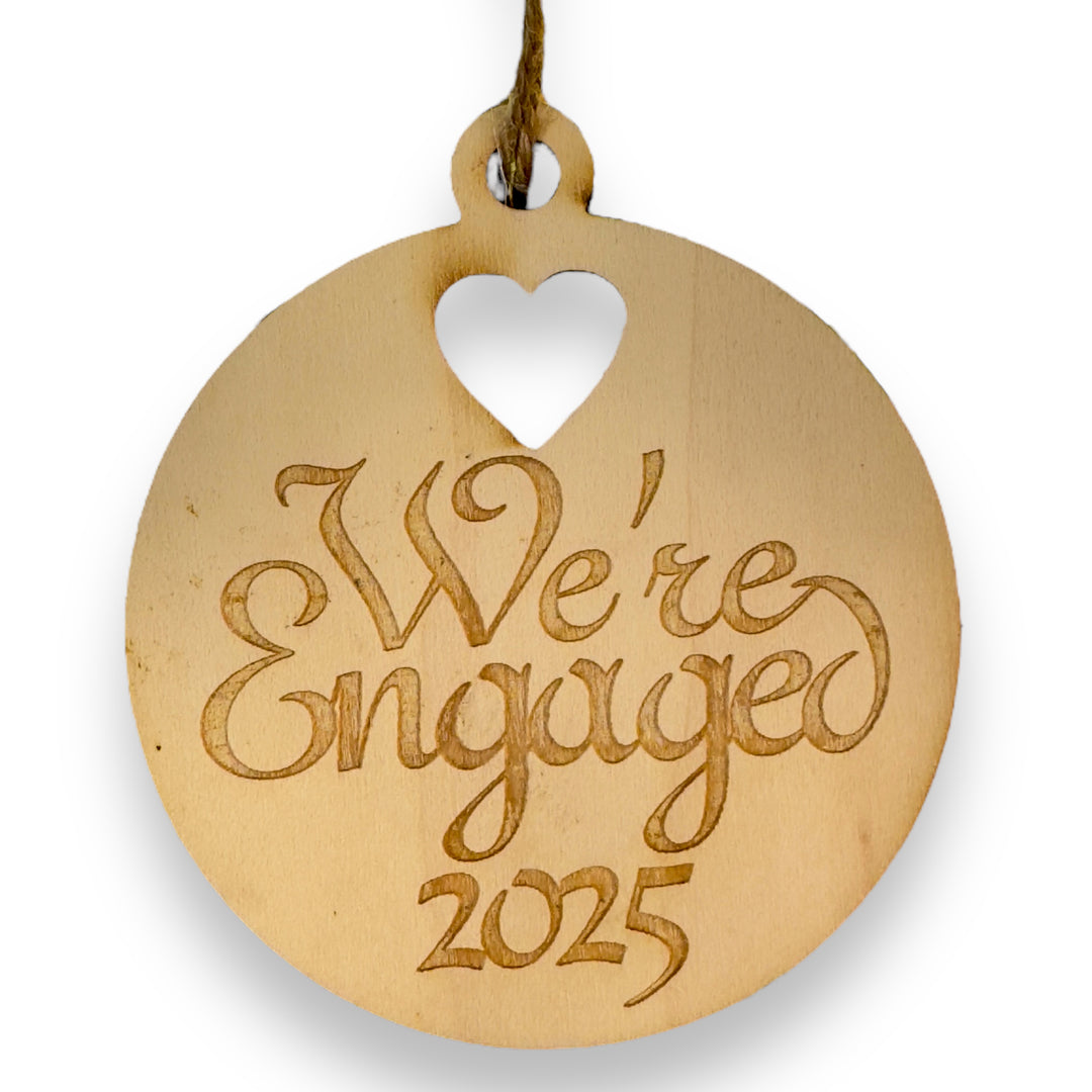 HipFlaskPlus raw wood We're Engaged 2025 heart ornament