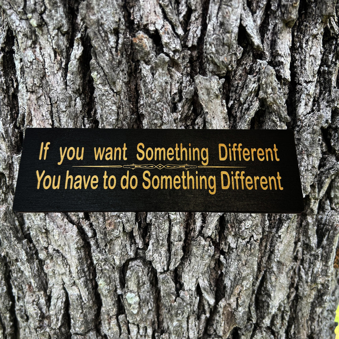HipFlaskPlus If You Want Something Different You Have to Do Something Different black wood sign on a tree trunk