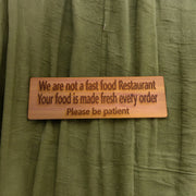 We are not a Fast Food Restaurant Your Food is Made Fresh Every Order Please be Patient Sign - Cedar Wood