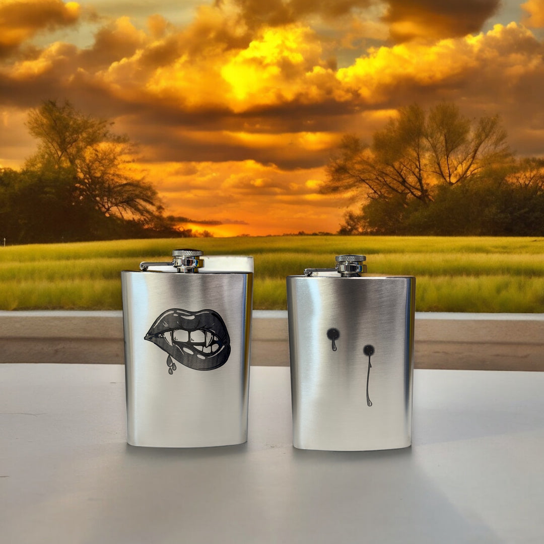 HipFlaskPlus 8oz stainless steel hip flasks engraved with his and hers vampire lips and fangs set of two at sunset