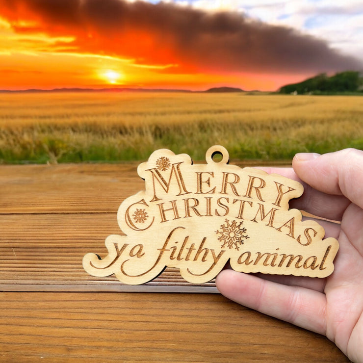 Ornament - Merry Christmas Ya Filthy Animal - Raw Wood 3x5in