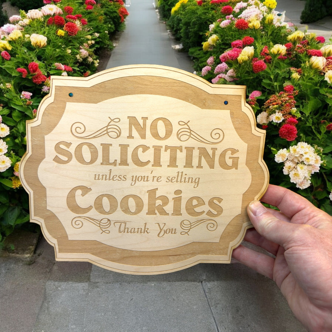 Hand holding a HipFlaskPlus No Soliciting Unless You&