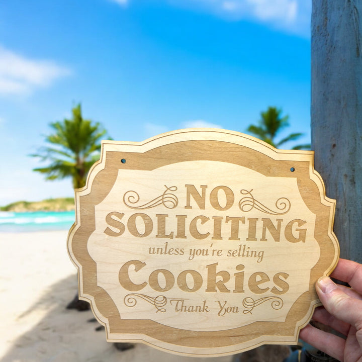 Hand holding a HipFlaskPlus No Soliciting Unless You&