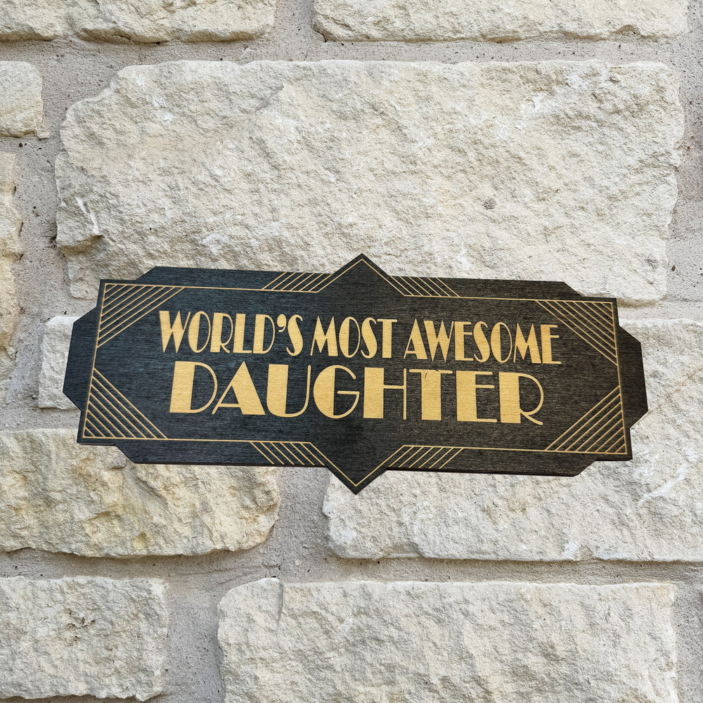 HipFlaskPlus World's Most Awesome Daughter black art deco wood sign on a stone wall