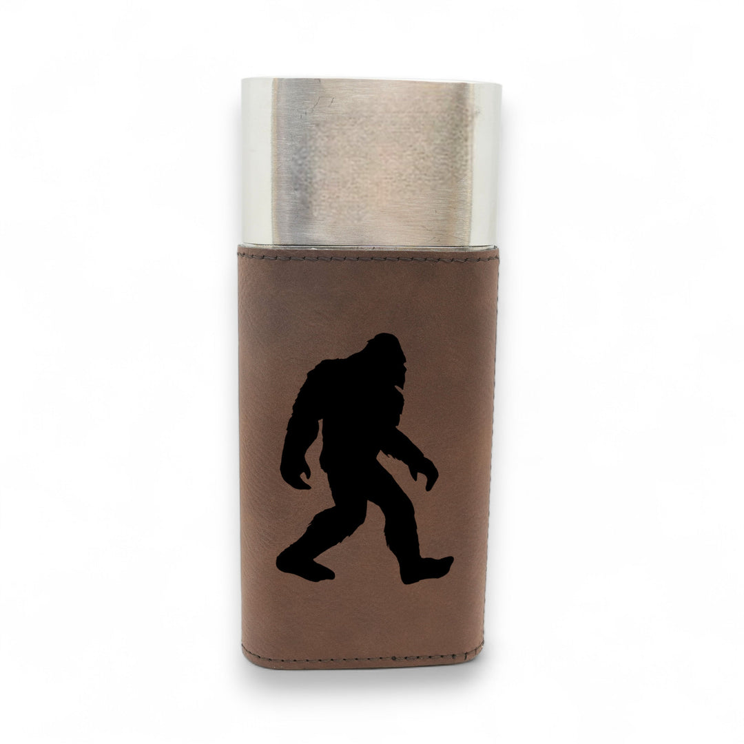 HipFlaskPlus brown leatherette cigar case featuring a black Bigfoot Sasquatch silhouette and integrated metal cutter