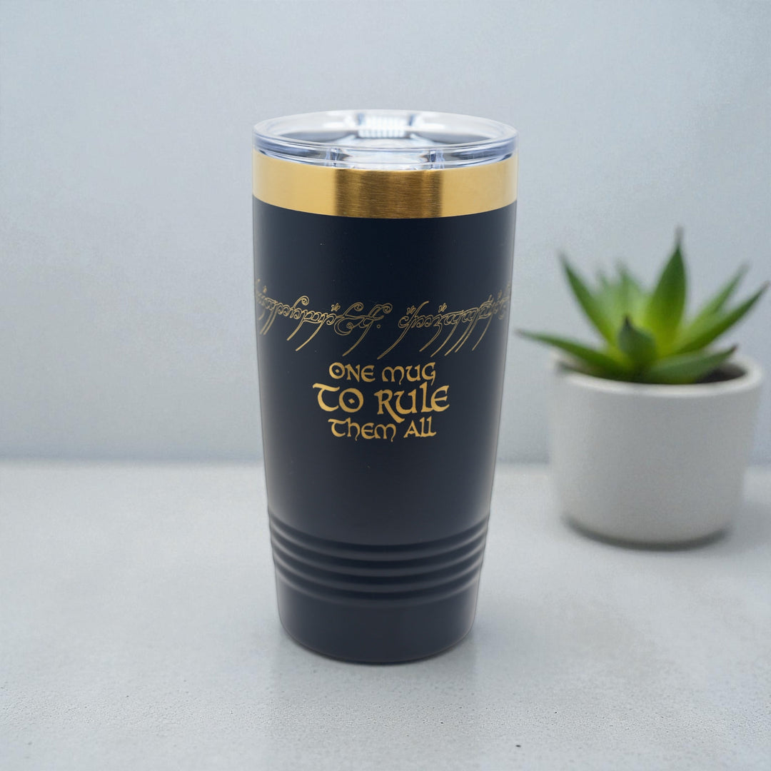 HipFlaskPlus 20oz black stainless steel tumbler with gold top band and laser engraved One Mug To Rule Them All text