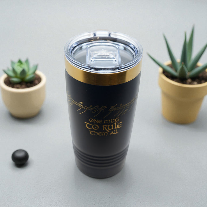 HipFlaskPlus 20oz black stainless steel tumbler with gold band and laser-engraved One Mug to Rule Them All design.