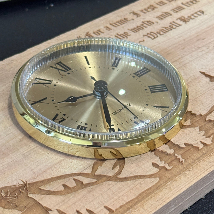 HipFlaskPlus cedar picket wall clock featuring a laser-engraved deer scene and a gold-toned quartz clock face.