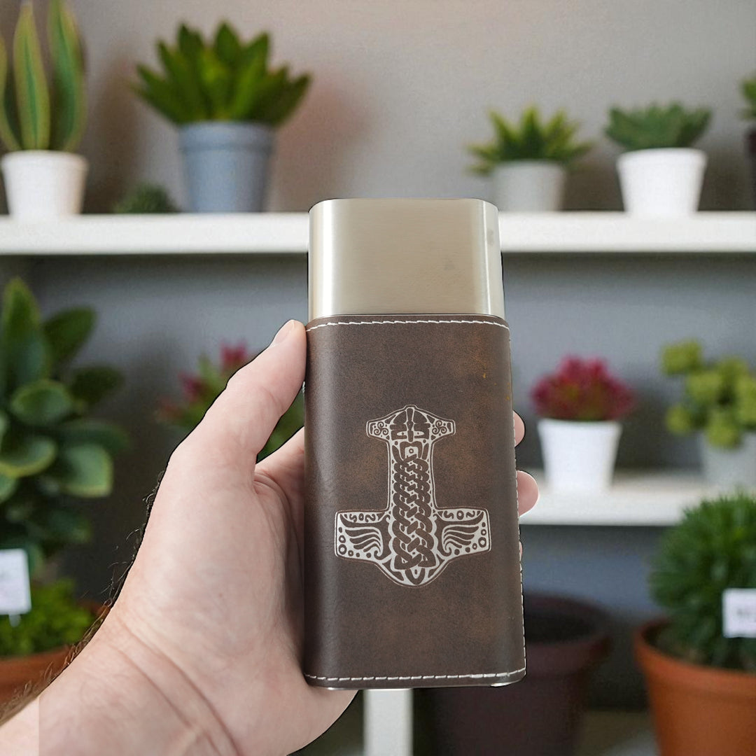 HipFlaskPlus brown leatherette cigar case featuring an engraved Mjolnir Thor hammer design and integrated metal cutter.