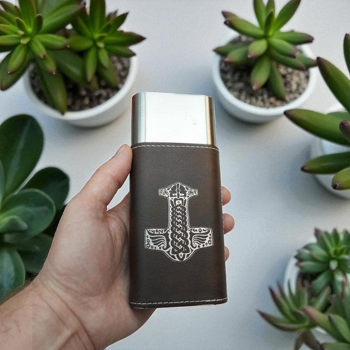 HipFlaskPlus brown leatherette cigar case featuring a laser-engraved Mjolnir hammer design and integrated cutter