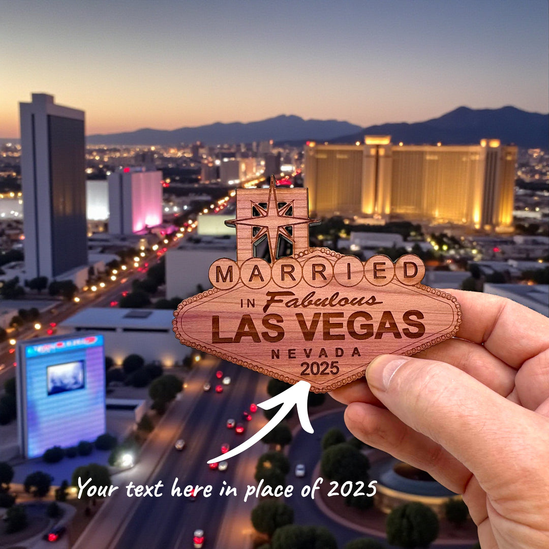 HipFlaskPlus personalized raw cedar wood ornament featuring a Las Vegas sign design held against a city skyline.