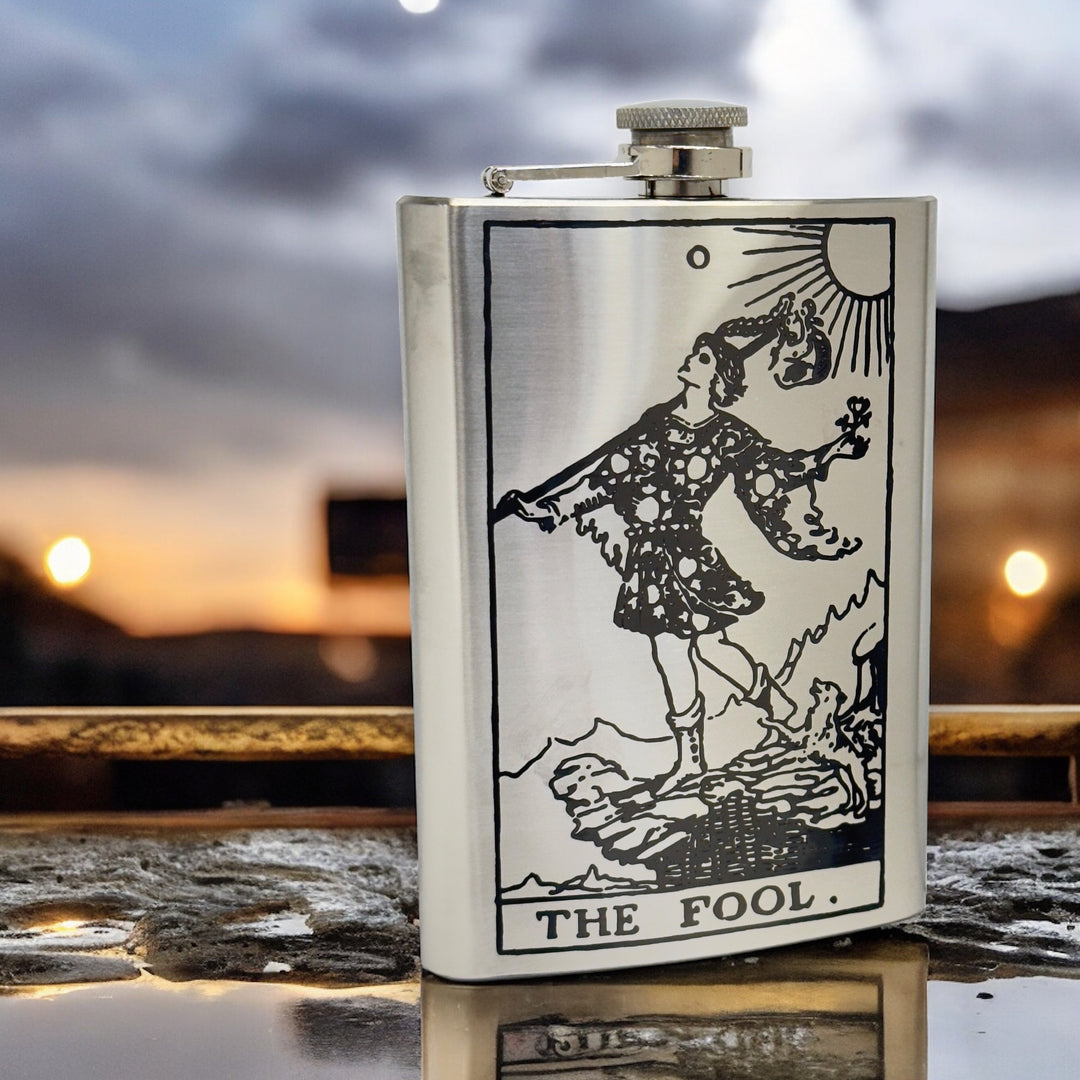 HipFlaskPlus 8oz stainless steel flask with laser-engraved The Fool tarot card design and screw-down cap.