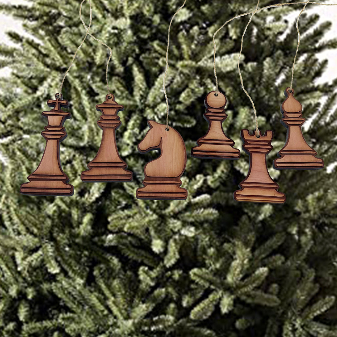 HipFlaskPlus set of 6 laser-cut wooden chess piece ornaments hanging on a Christmas tree