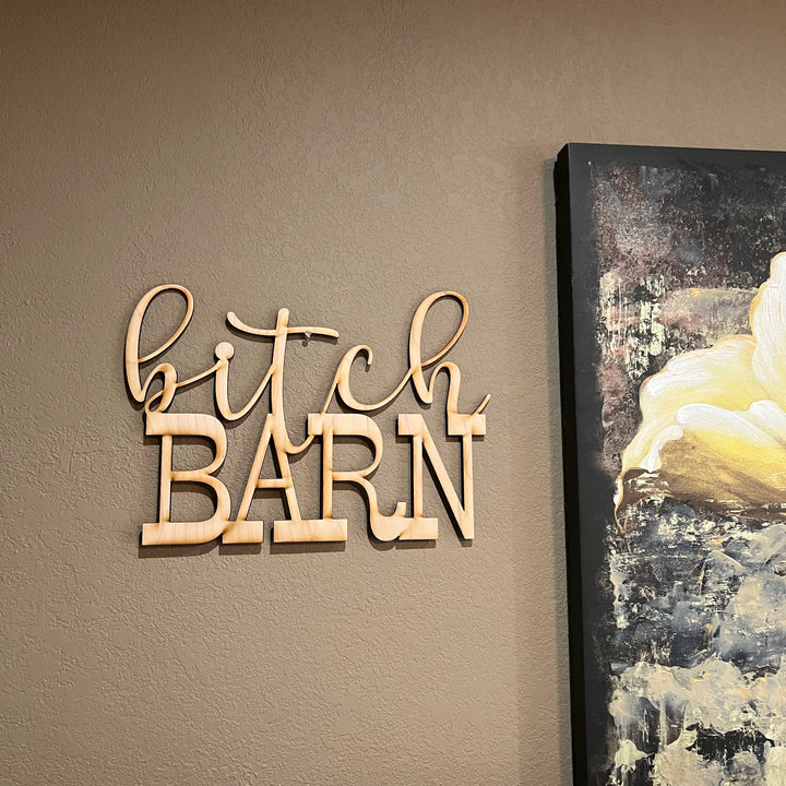 HipFlaskPlus Bitch Barn maple wood cutout sign on a wall