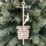 Ornament - Christmas Lights Powered by Your Favorite Lineman - Raw Wood 3x9in