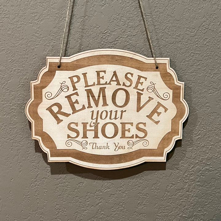 HipFlaskPlus Please Remove Your Shoes raw wood door sign hanging on rustic wood