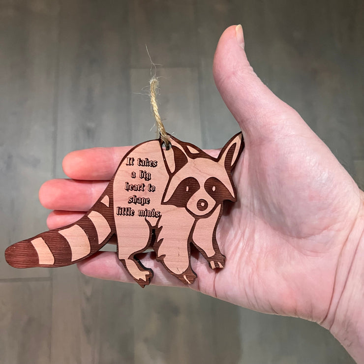 RACCOON it takes a big heart to shape little minds - Cedar Ornament