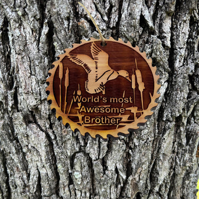Sawblade with Duck Worlds Most Awesome Brother - Cedar Ornament