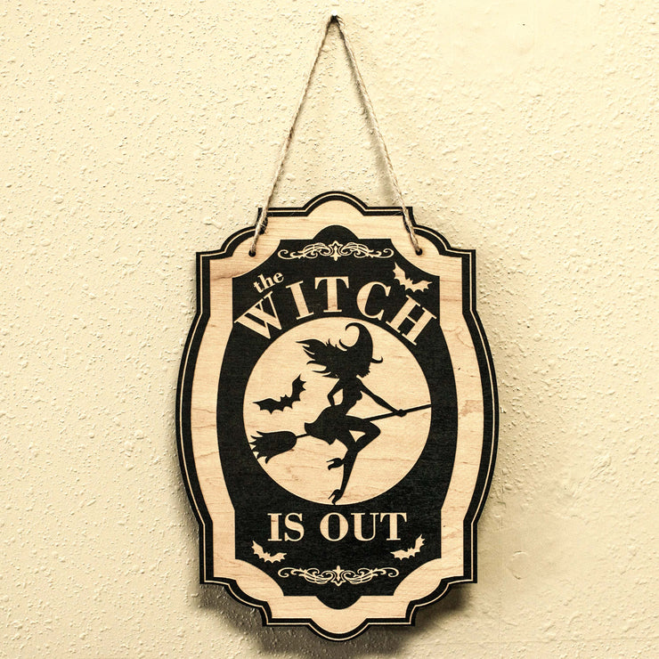 The Witch is Out - Black Halloween Door Sign 6x9