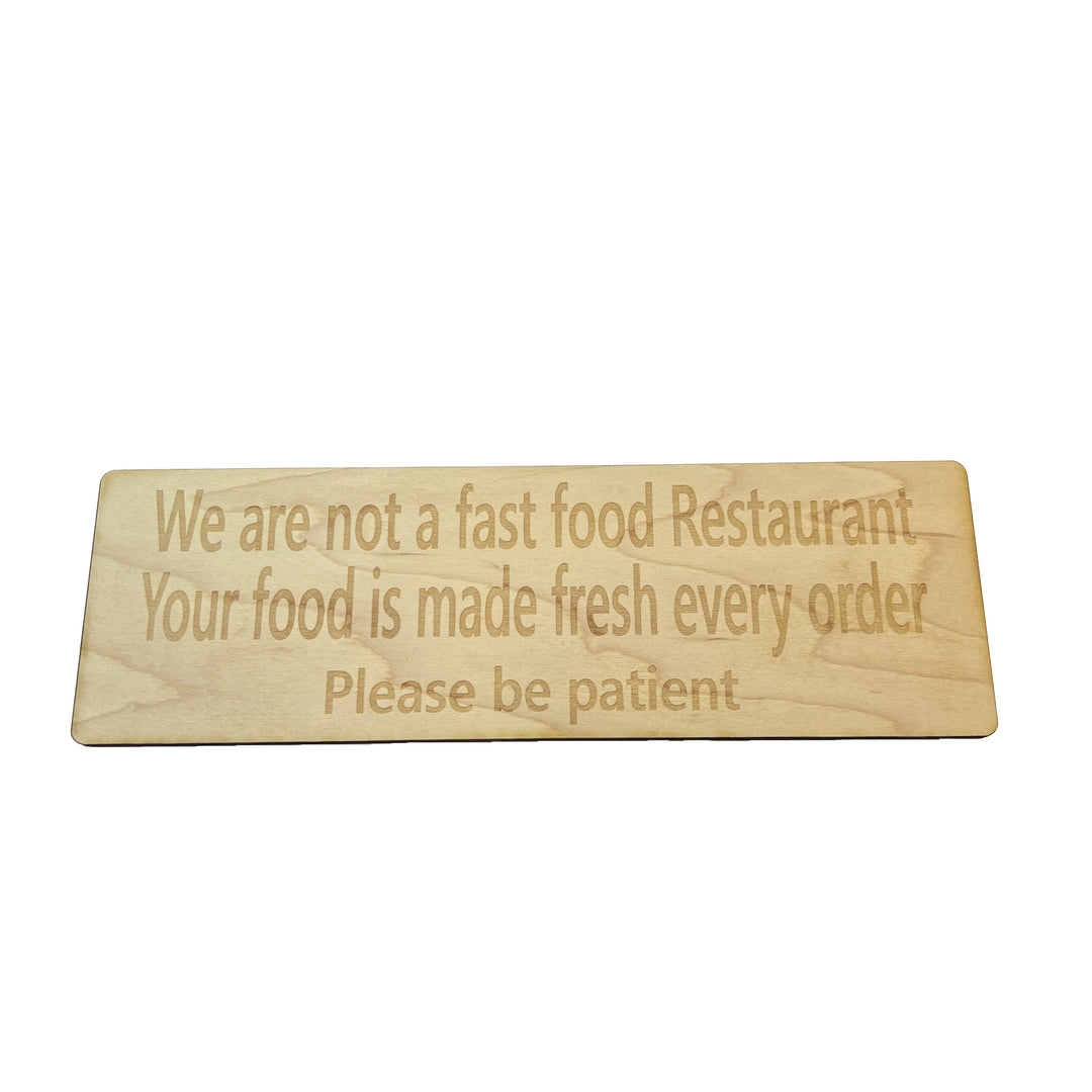 HipFlaskPlus custom We Are Not a Fast Food Restaurant Please Be Patient sign in natural wood