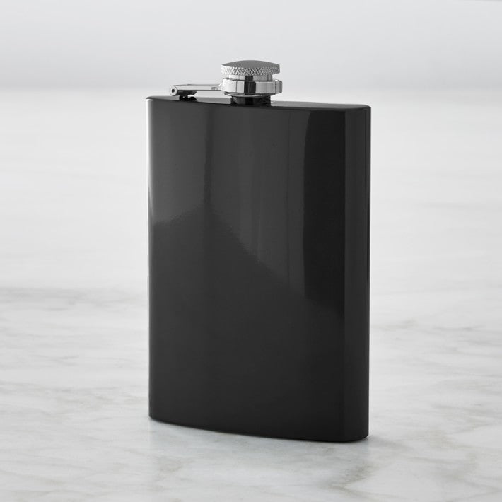 HipFlaskPlus 8oz black stainless steel hip flask on a gray background